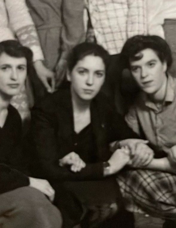 Three young men in a vintage black and white portrait